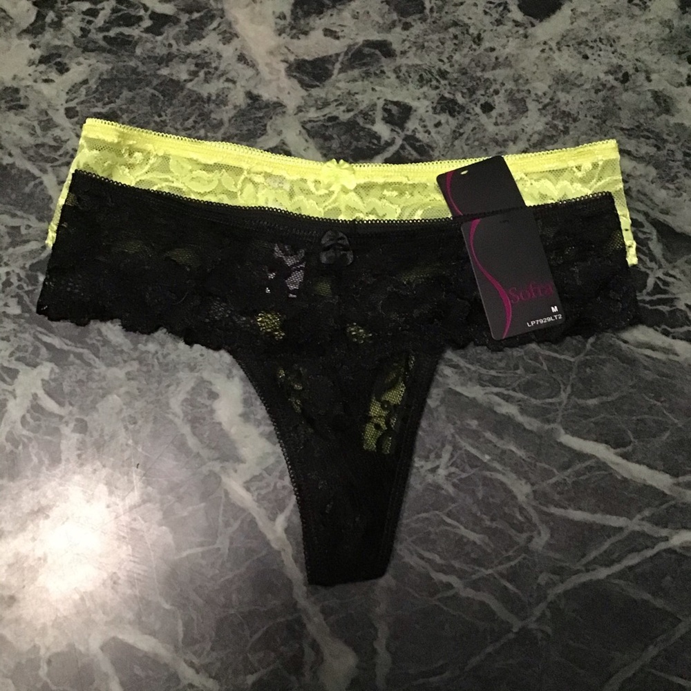 Set of yellow and black lace thongs